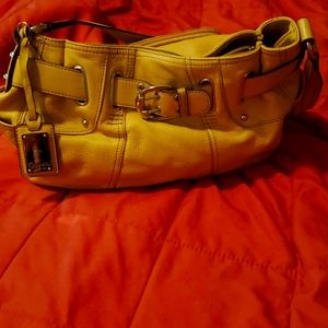 Tignanello purse. Gently used yellow. Needs a bath 😁
